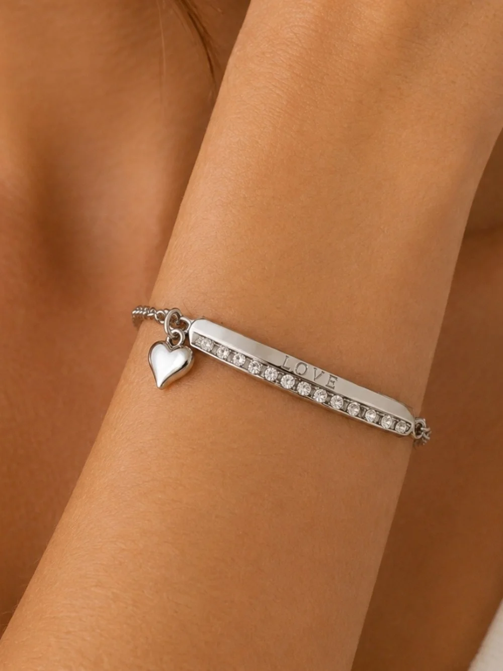 Silver Tone Rhinestone Adjustable Bracelet with Heart Charm Inscribed with Love